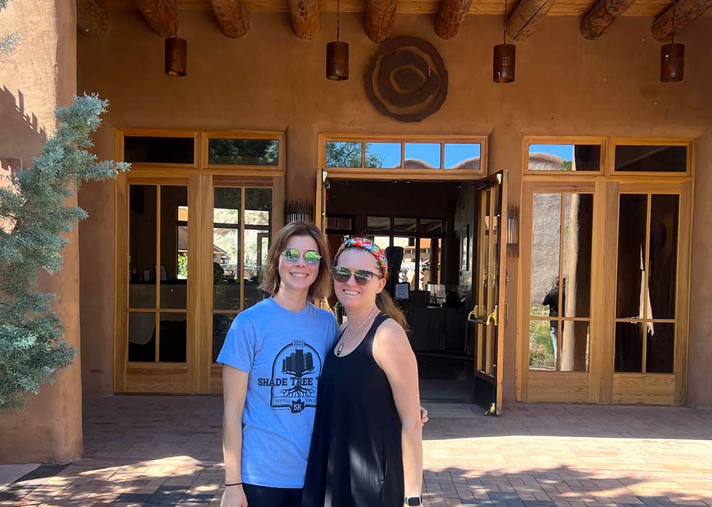 Heather & Sheri in front of Ojo Caliente Resort in New Mexico