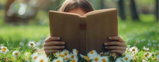 Girl Reading in Flowers